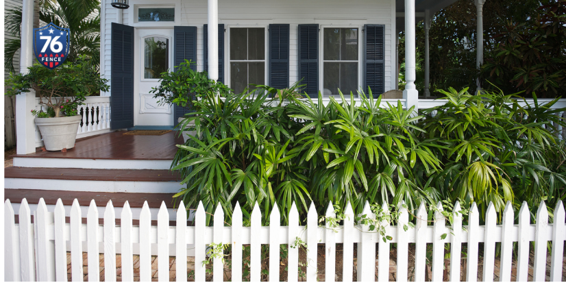 A classic white picket fence from 76 FENCE - learn more about boosting your curb appeal with the right fence in Charlotte, NC.