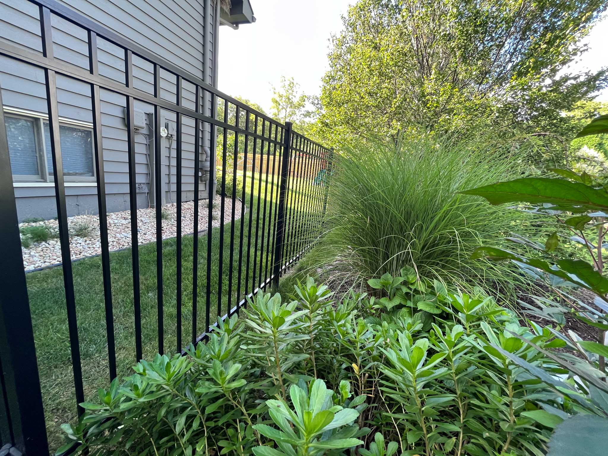 An aluminum residential fence - book 76 FENCE for Mt. Juliet aluminum fencing repairs.