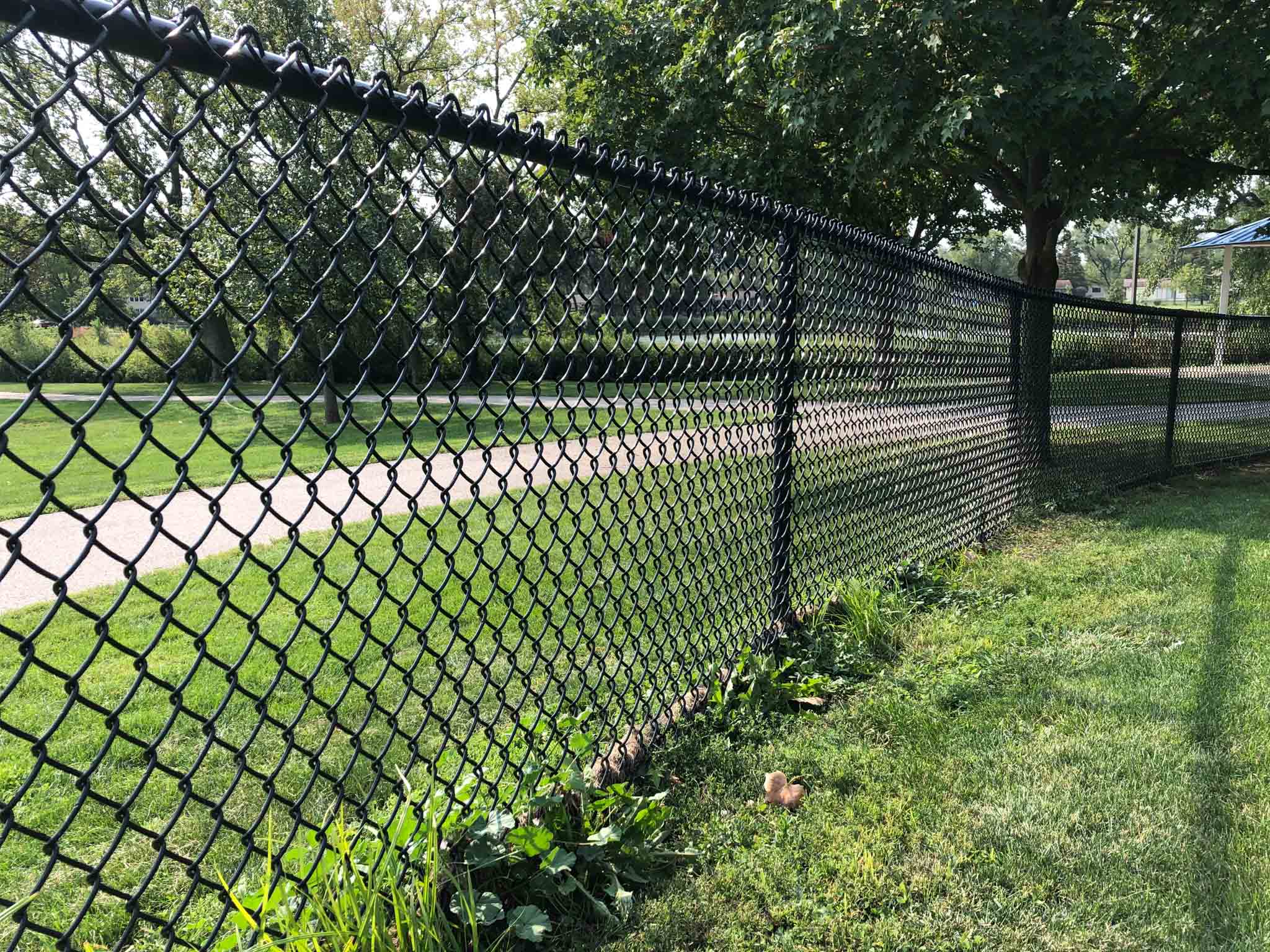 A secure chain link fence installed by 76 FENCE North Nashville.