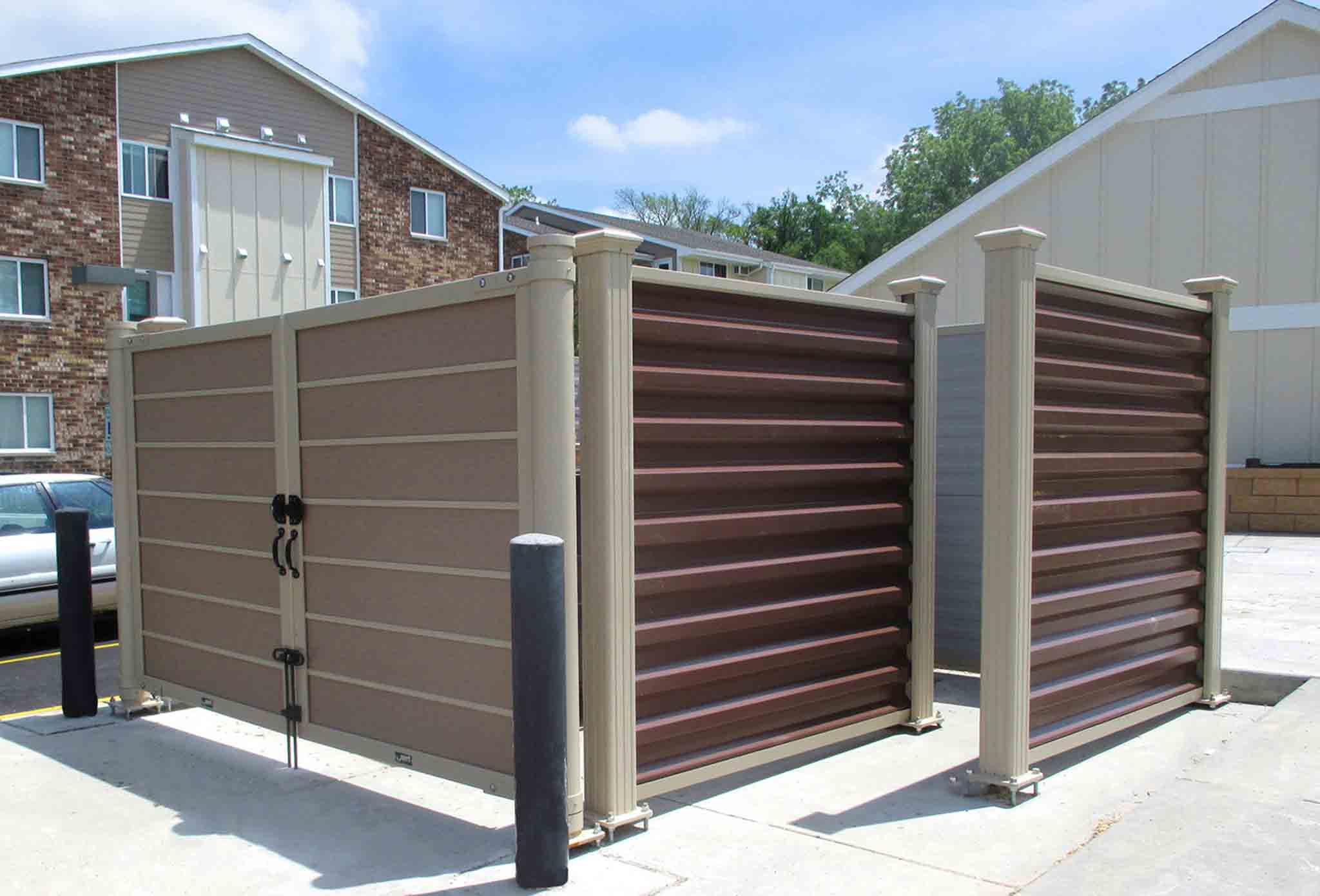 A 76 FENCE North Charlotte commercial dumpster enclosure gates.