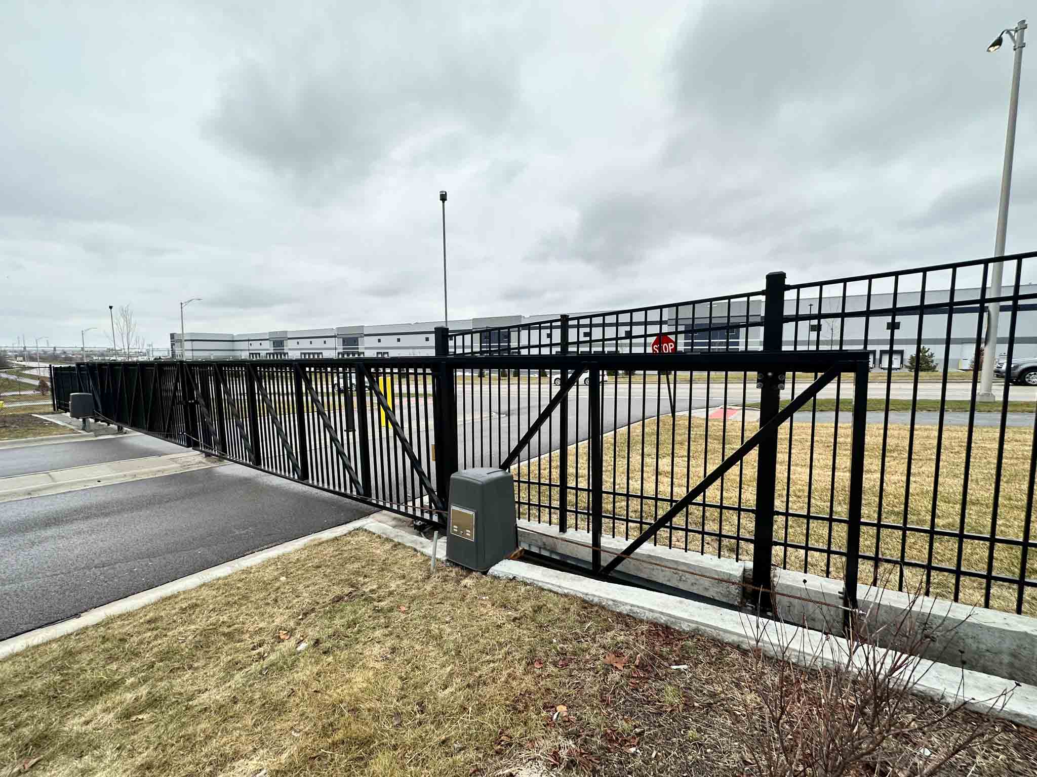 A a gate used with a industrial fence in Jacksonville, NC.