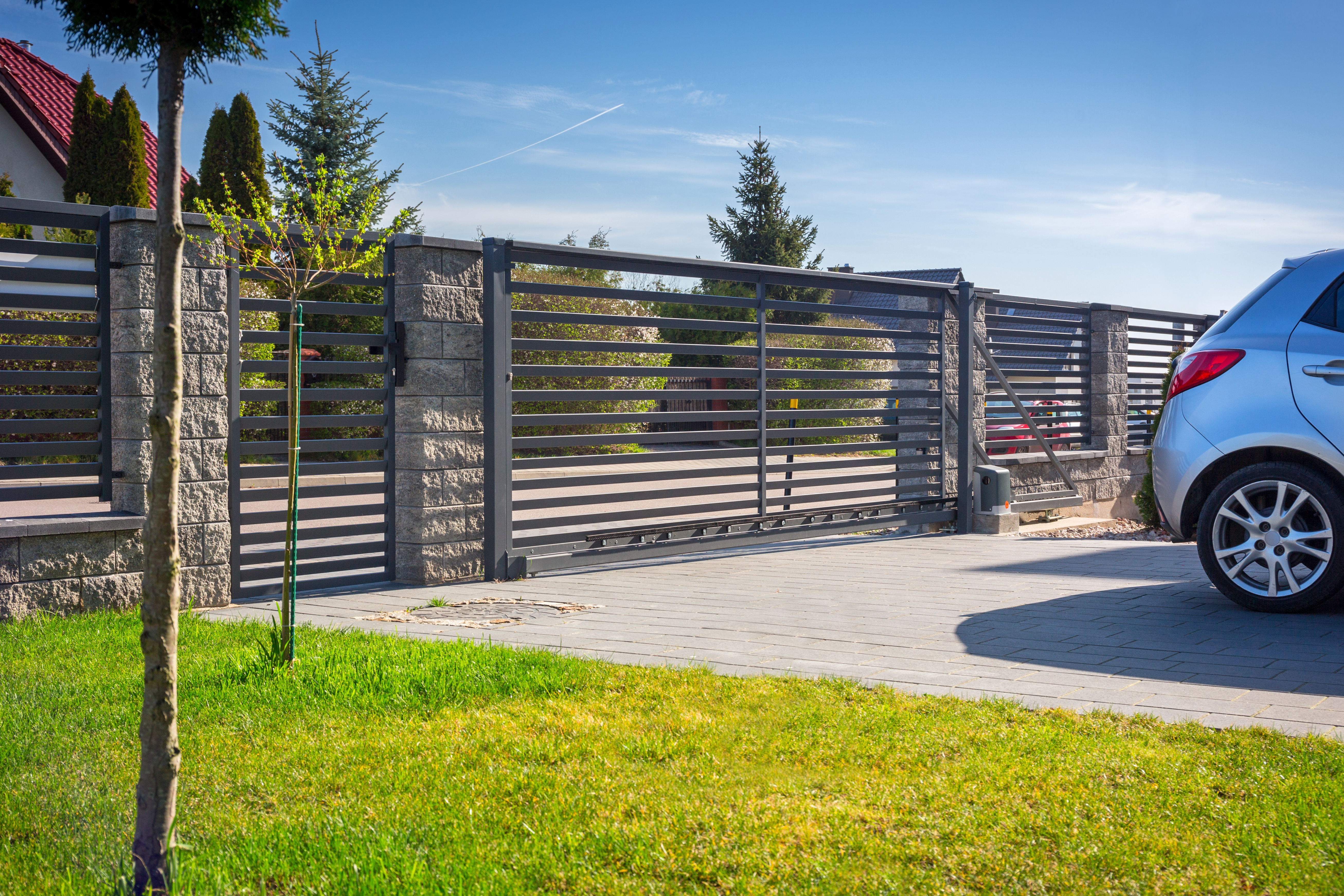 A metal automatic gate in - contact 76 Fence to install your Douglasville automatic security gates for driveways.