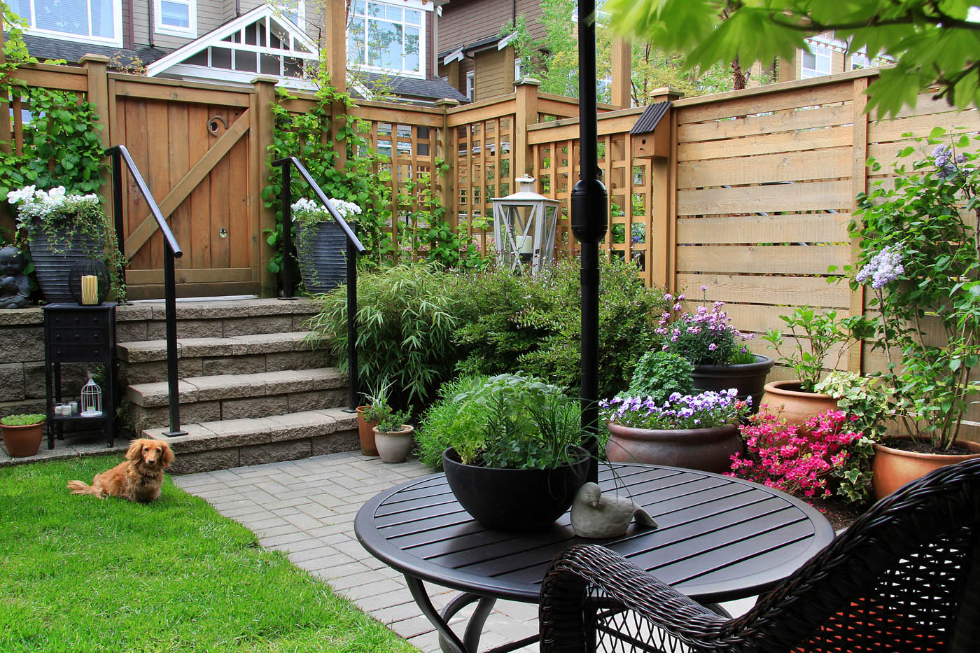 A backyard of a residential home with a custom fence option.