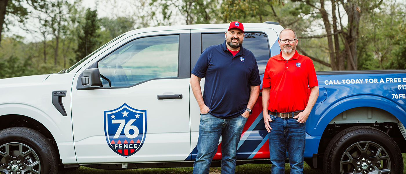 76 Fence Greater Cincinnati owners standing by a truck, provided by our fencing company.