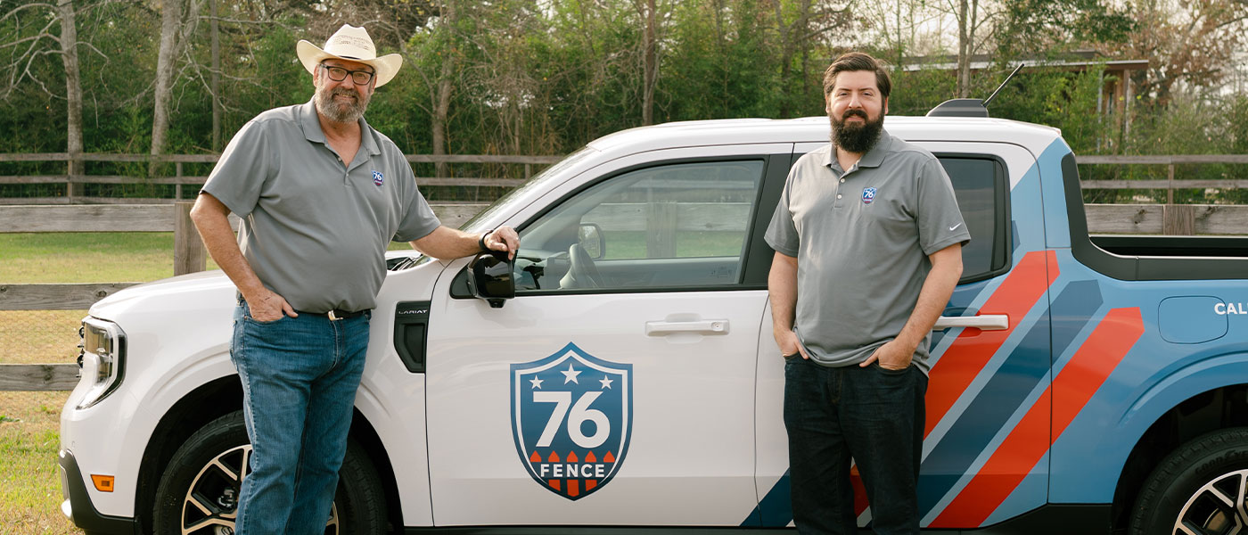 76 Fence North Houston owners standing by a truck, provided by our fencing company.