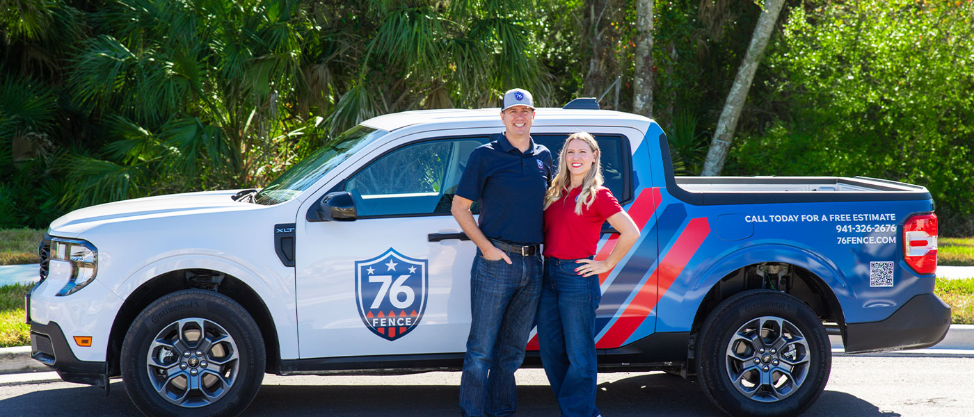 76 Fence Sarasota-Bradenton owners standing by a truck, provided by our fencing company.