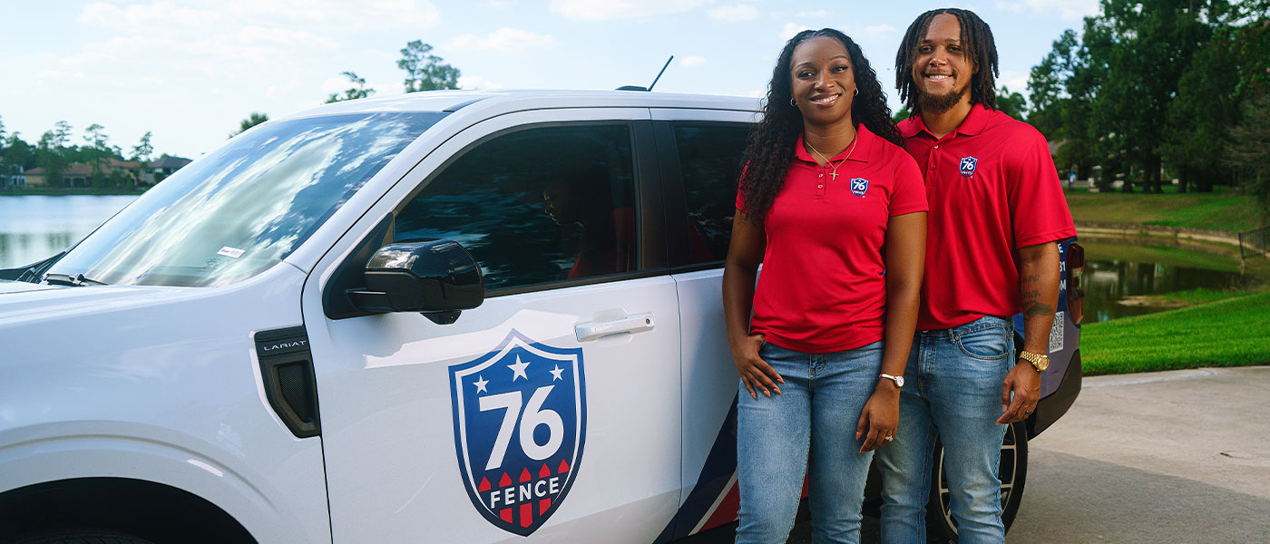 76 Fence Southeast Houston owners standing by a truck, provided by our fencing company.