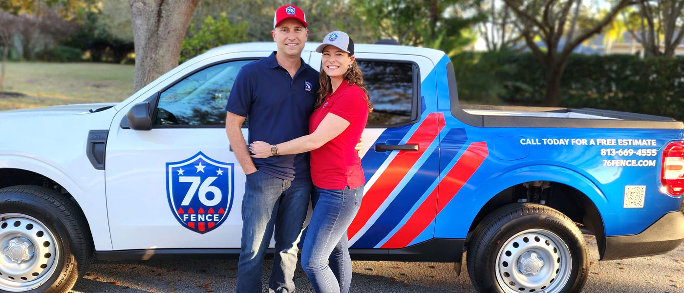76 Fence Tampa (Lutz) owners standing by a truck, provided by our fencing company.